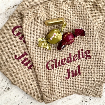 Julesæk med "Glædelig Jul" tekst og 1000 gram luksus chokoladeblanding